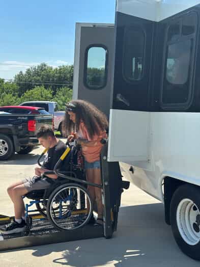 Volunteer pushes passenger out of bus
